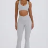 Soft Active leggings med V-formet linning, lommer og utvidet ben i grått