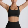Super Sculpt sømløs T-rygg sports-BH i svart