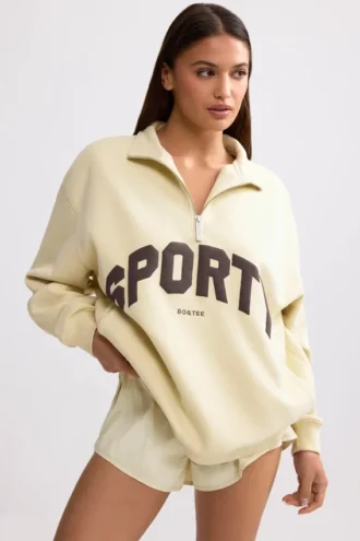 Sweatshirt med kvart glidelås i fargen Bone