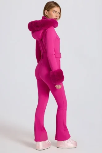 Vanntett skidress med hette i imitert pels i magenta rosa