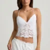Vasilia Cutwork ryggløs bomullspoplin-camisole-top i hvitt