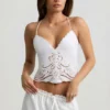 Vasilia Cutwork ryggløs bomullspoplin-camisole-top i hvitt