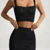 Yolanda Pointelle-strikket crop-top i svart