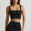 Yolanda Pointelle-strikket crop-top i svart