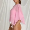 Zarayah gjennomsiktig poncho i Candyfloss Pink