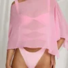 Zarayah gjennomsiktig poncho i Candyfloss Pink