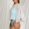 Zarayah gjennomsiktig poncho i hvit