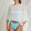 Zarayah gjennomsiktig poncho i hvit